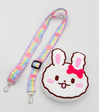 Bolso de silicona blanco con forma de conejo y detalles en rosa suave.