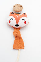 Oranges Schnullerband aus Stoff mit Fuchsgesicht und Holzclip