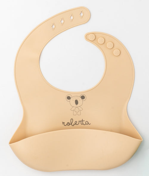 Lätzchen aus Silikon in hellem Pfirsichton mit dem Namen Roberta und einem Koala, graviert
